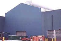 Exterior of building with blue siding