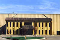 Exterior of building with yellow siding