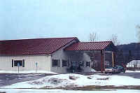 Exterior of building with brown roof