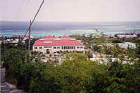 Exterior of building with red metal roof