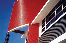 Commercial Building with curved siding in red