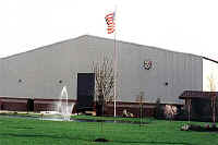 Exterior of building with beige metal siding